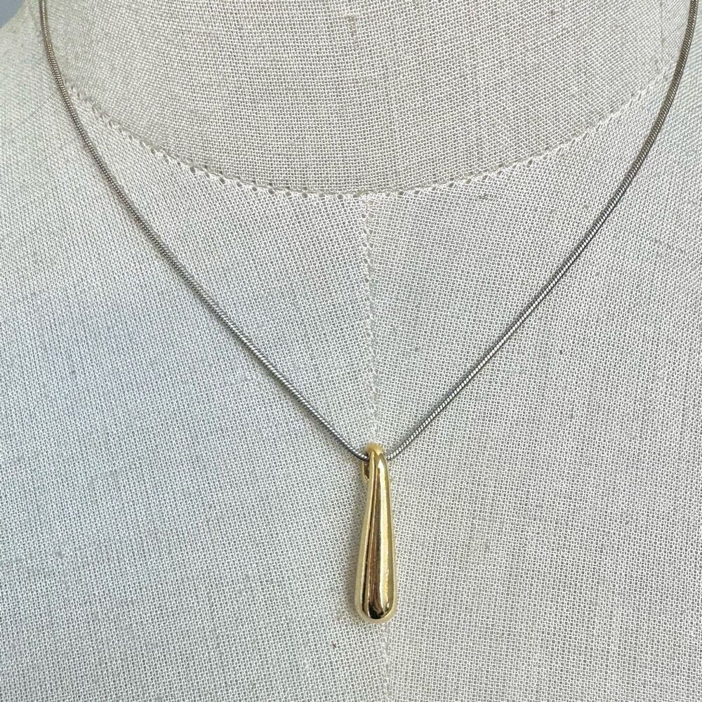 Gold tone pendant necklace